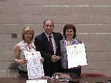 Murayama sensei congratulating 1st dan recipient (L) Margaret Maclennan & 3rd dan recipient Arlene Viscount.