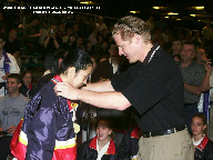 Curt Harnett presenting gold medal.