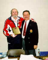 Tournament Physician, Dr. Alastair McDonald Murray, receiving Appreciation Award from Sensei Moledzki.