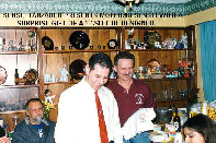 Sensei Tanzadeh receives gift from Sensei Moledzki.