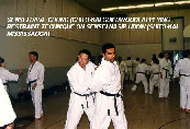 Sensei Dave Chong (Chito-kai Guildwood) applying restraint technique on Sensei Nasir Uddin (Shito-kai Mississauga).