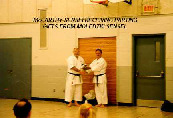 McCarthy sensei receiving parting gifts from Moledzki sensei.