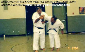 Sensei McCarthy applying pressure point & joint manipulation on Dave Leduc (Shito-kai Midland).