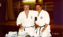 Moledzki sensei presenting McCarthy sensei with parting gifts.