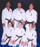 Congratulations to successful new 1st degree black belt recipients (l-r) Front Row: Mallory Wright, Lauren Wright , and Lauren Kussen from Penetang Shito-kai Canada dojo.  (l-r) Back Row: Instructor Ken Desjardins 3rd Dan; Examiners Iwata Genzo, 7th Dan and Murayama Kunio, 7th Dan.