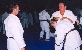 Sensei Moledzki applying Nanban Sattoryu techniques on Lauren Kussen while her sensei Ken Desjardins looks on.