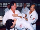 Sensei Moledzki receiving adjustments of Nanban Sattoryu techniques by sensei Murayama.