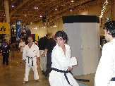 (L-R): Sensei Sam Moledzki (President of Karate Ontario) and Saeed Baghbani  (Canadian National Champion 2002 and 2002 Pan American Karate Federation Gold medalist black belt champion), with Ehsan Debaji looking on.