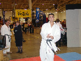 Mohamed Fezali is caught off-guard for a brief moment while sensei Sam Moledzki and wife Sandi talk about Queen Elizabeth II's tour, just before her Majesty arrives. 