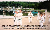 Sensei Pronovost instructing kata while Sensei Moledzki supervises.