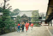 Canadian Team walking toward Hondo (Main Building) & Bell Tower.